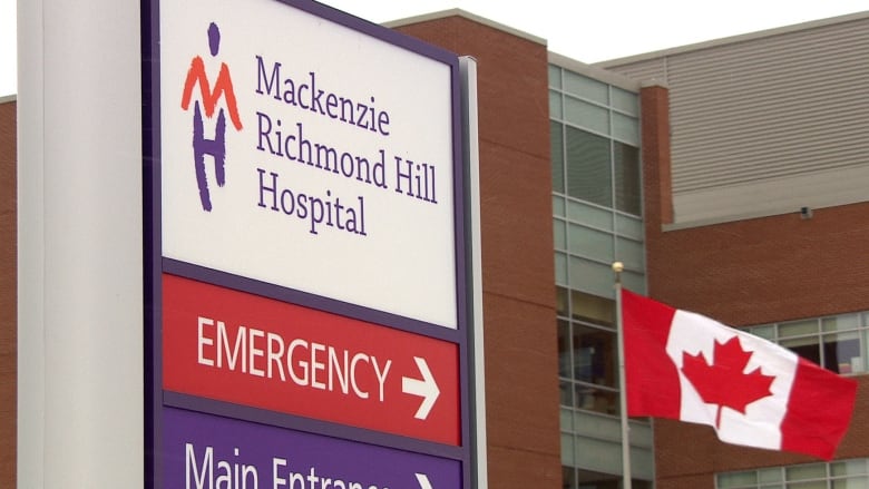A sign that says Mackenzie Richmond Hill Hospital, and Emergency